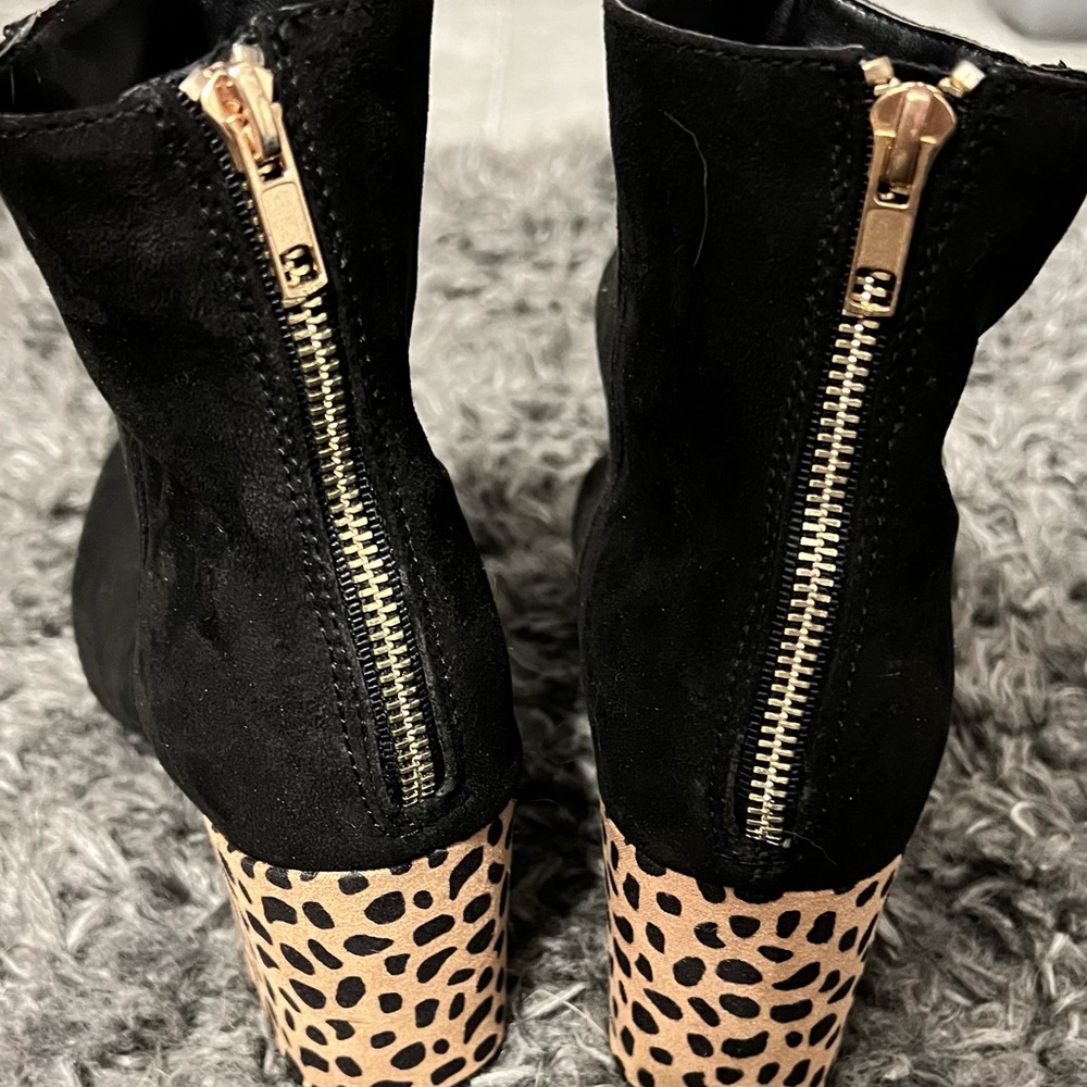 Black booties with cheetah print detail! Soooooo adorable